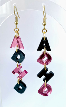 Sekamelska, pinkki-musta