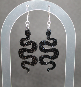 Suojelija - musta glitter