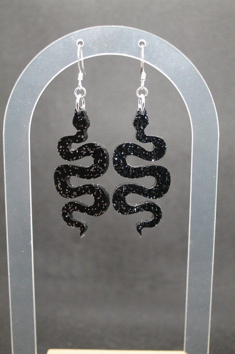 Suojelija - musta glitter