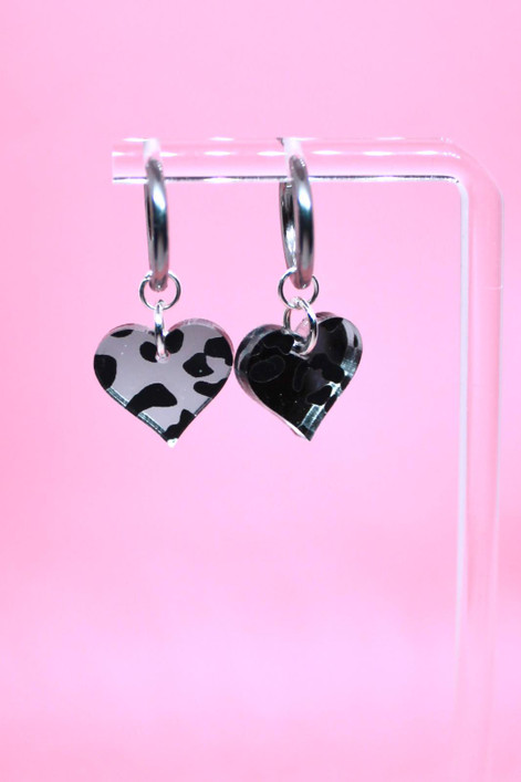 Hertta- leopardi hopea