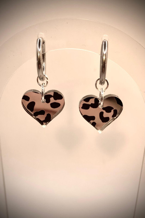 Hertta- leopardi hopea