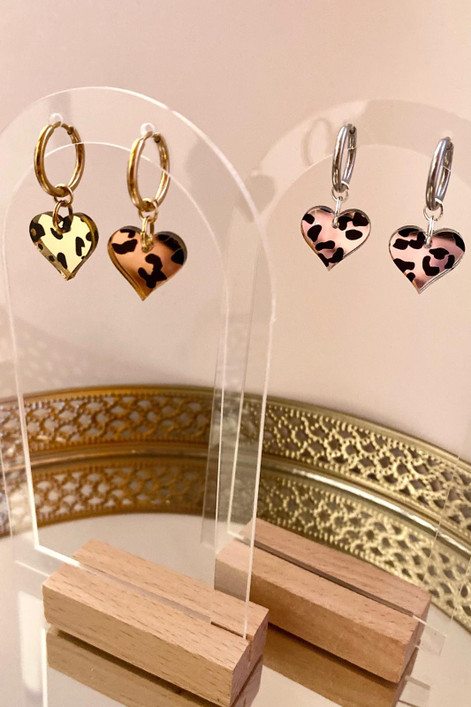 Hertta- leopardi hopea