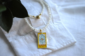 Helmikaulakoru kullatulla The Star riipuksella