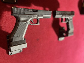 Glock 17-seinäteline (vaaka)