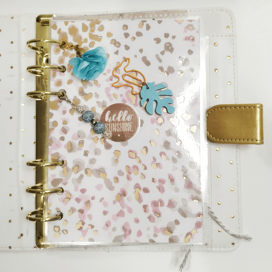 Kalenterikoru, pupu peikonlehdellä. Turkoosi väritys