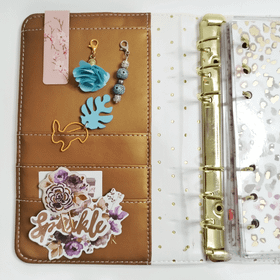 Kalenterikoru, pupu peikonlehdellä. Turkoosi väritys