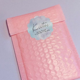 Pyöreä, kukan muotoinen kiitostarra