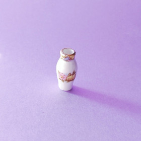 Posliini maljakko nukkekotiin