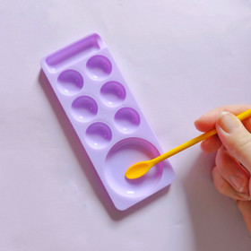 Kaksipäinen silikonikaavin