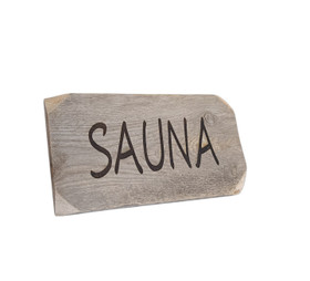 Kaiverrettu kelo sauna-kyltti