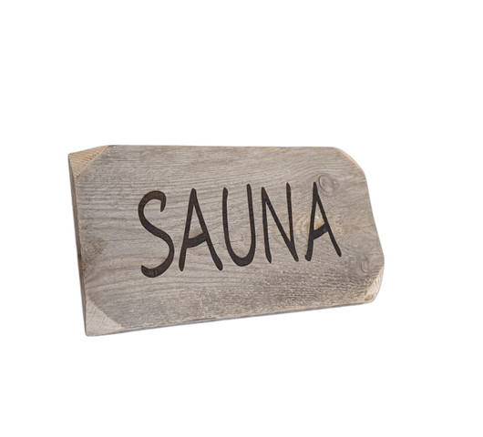 Kaiverrettu kelo sauna-kyltti